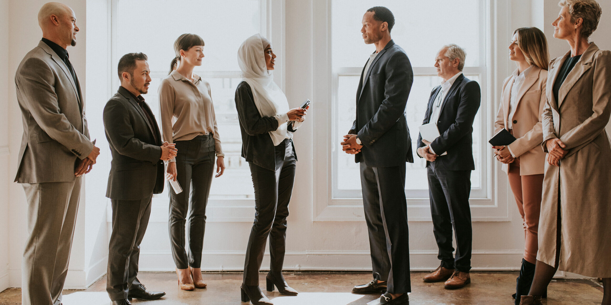 Diverse business people standing together